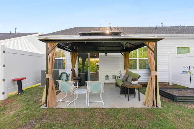 122 Aleppo, Greer, SC 29651 - rear view of property with central AC, a shingled roof, a gazebo, fence, and a patio