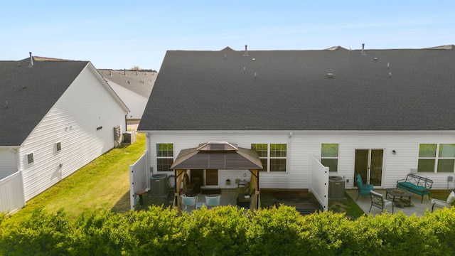122 Aleppo, Greer, SC 29651 - back of house with central AC unit, fence, a patio, and a lawn