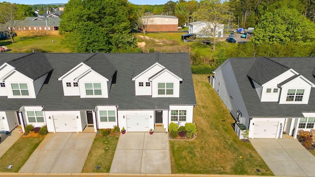 122 Aleppo, Greer, SC 29651 - view of front facade with a residential view, a front yard, an attached garage, a shingled roof, and driveway