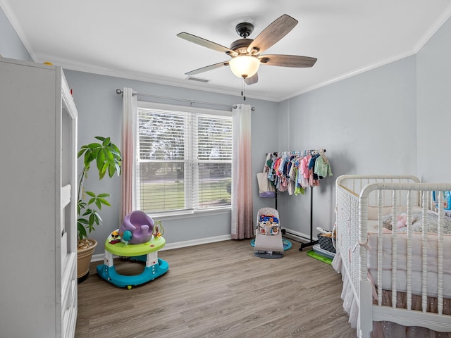 110 Miller Spgs, Moore, SC 29369 - bedroom featuring baseboards, crown molding, a ceiling fan, visible vents, and wood finished floors