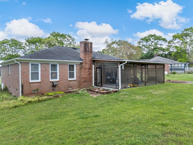 110 Miller Spgs, Moore, SC 29369 - back of property featuring a shingled roof, a sunroom, a yard, a chimney, and brick siding