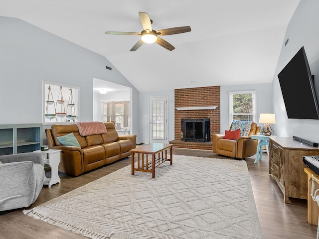 110 Miller Spgs, Moore, SC 29369 - living area featuring a fireplace, vaulted ceiling, a ceiling fan, and wood finished floors