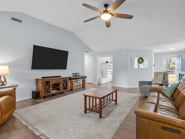 110 Miller Spgs, Moore, SC 29369 - living area with wood finished floors, visible vents, vaulted ceiling, and ceiling fan