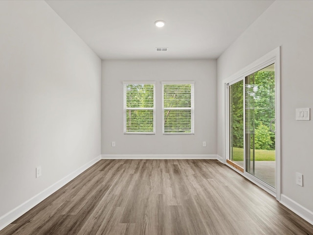 217 Merriweather, Spartanburg, SC 29301 - unfurnished room with wood finished floors and baseboards