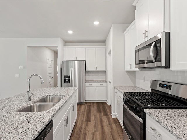 217 Merriweather, Spartanburg, SC 29301 - kitchen with appliances with stainless steel finishes, a sink, dark wood-style floors, white cabinetry, and recessed lighting