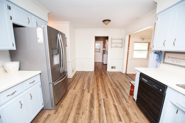 kitchen featuring stainless steel refrigerator with ice dispenser, dishwasher, ornamental molding, light countertops, and light wood-style flooring