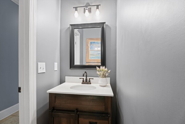 208 W Coosaw, Roebuck, SC 29376 - bathroom featuring vanity, baseboards, and tile patterned flooring