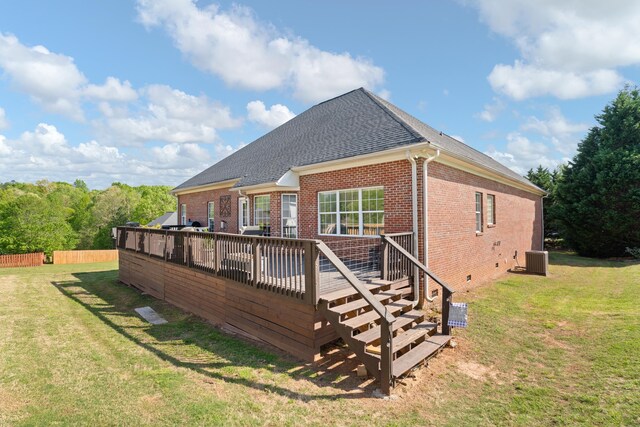 208 W Coosaw, Roebuck, SC 29376 - rear view of house featuring central air condition unit, a yard, a wooden deck, and brick siding