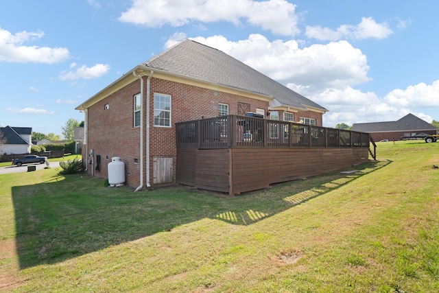 208 W Coosaw, Roebuck, SC 29376 - back of property with roof with shingles, a lawn, a deck, and brick siding