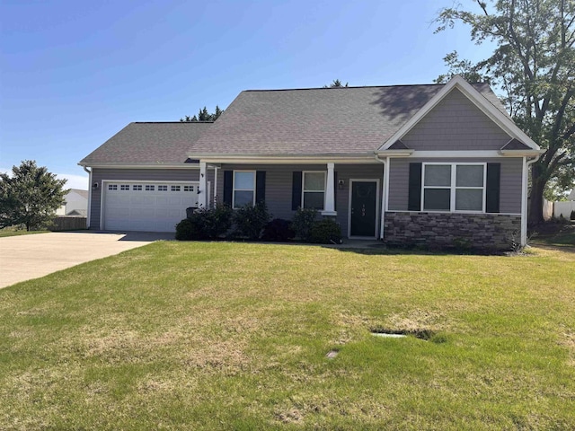 103 Lily, Lyman, SC 29365 - view of front of property featuring a garage, stone siding, a front lawn, a shingled roof, and concrete driveway