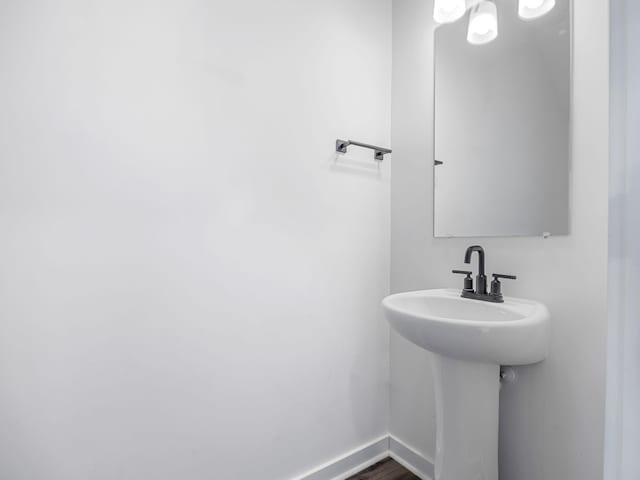 bathroom featuring baseboards