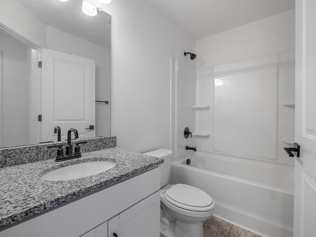 full bath with tile patterned flooring, toilet, vanity, and shower / washtub combination
