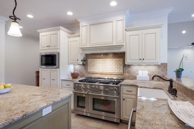 865 Westmoreland, Greer, SC 29651 - kitchen featuring light stone counters, a sink, pendant lighting, stainless steel appliances, and backsplash