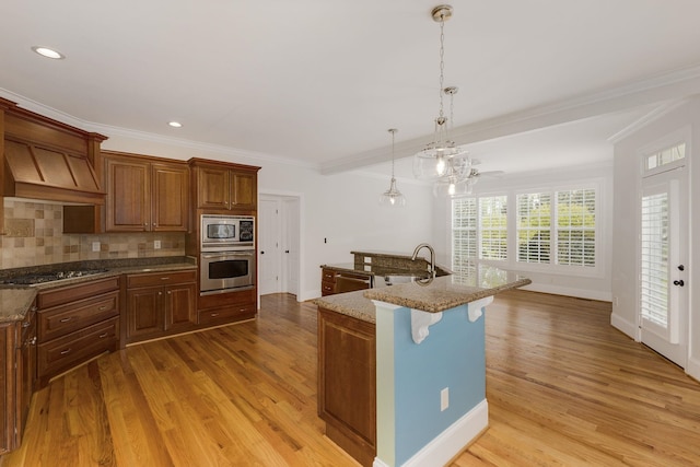 6 Pepper Bush, Greer, SC 29651 - kitchen featuring backsplash, light wood-style flooring, stainless steel appliances, and a sink