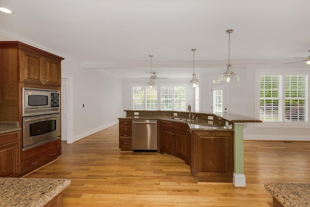 6 Pepper Bush, Greer, SC 29651 - kitchen with stainless steel appliances, a sink, light wood-type flooring, baseboards, and ceiling fan