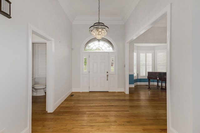 6 Pepper Bush, Greer, SC 29651 - entryway featuring crown molding, light wood finished floors, baseboards, and a notable chandelier