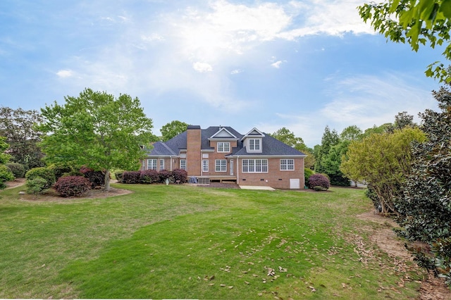 6 Pepper Bush, Greer, SC 29651 - rear view of property featuring a chimney, brick siding, and a yard