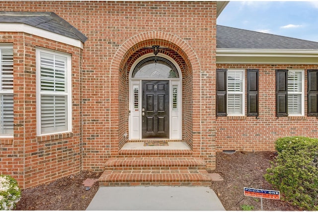 6 Pepper Bush, Greer, SC 29651 - view of exterior entry featuring brick siding and a shingled roof