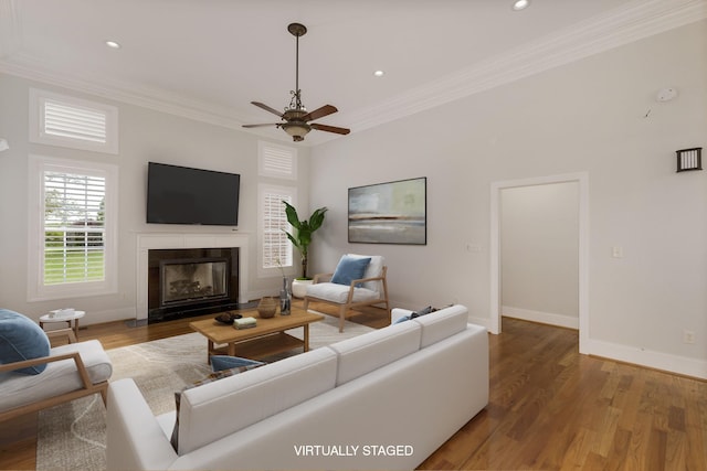6 Pepper Bush, Greer, SC 29651 - living room featuring a fireplace with flush hearth, a wealth of natural light, crown molding, and baseboards