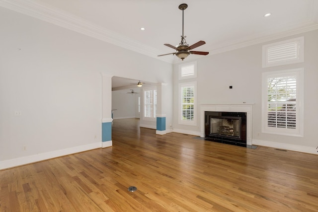 6 Pepper Bush, Greer, SC 29651 - unfurnished living room with a fireplace with flush hearth, ceiling fan, ornamental molding, and light wood finished floors