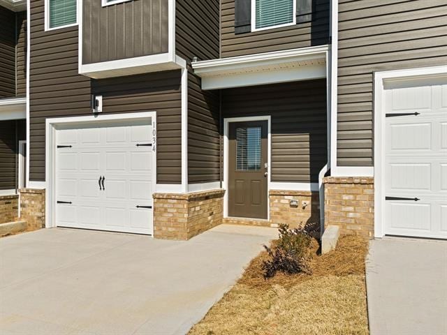 1036 Cargo, Spartanburg, SC 29306 - property entrance with brick siding and a garage