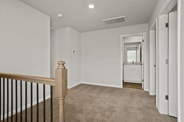 1036 Cargo, Spartanburg, SC 29306 - interior space featuring carpet floors, an upstairs landing, visible vents, and baseboards