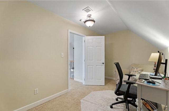 office with lofted ceiling, light carpet, baseboards, and visible vents