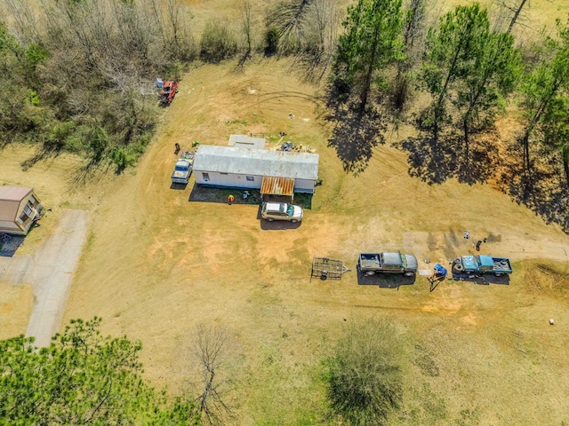 birds eye view of property featuring a rural view