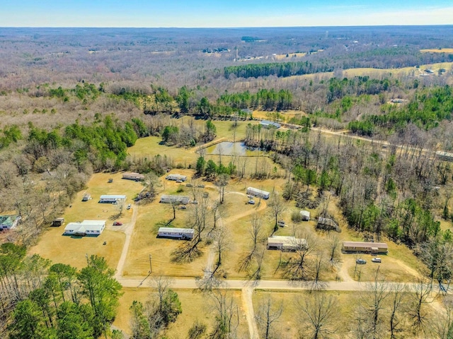 aerial view with a wooded view