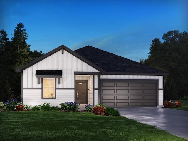 view of front of house with a shingled roof, a front lawn, concrete driveway, an attached garage, and board and batten siding