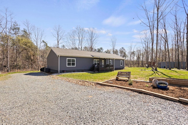 single story home featuring crawl space, a front yard, and a deck
