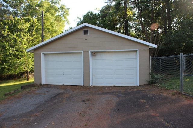 detached garage with fence