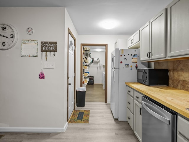 228 Anita, Spartanburg, SC 29302 - kitchen with wooden counters, black microwave, light wood-type flooring, dishwasher, and backsplash