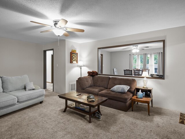 228 Anita, Spartanburg, SC 29302 - living room featuring light colored carpet, a ceiling fan, a textured ceiling, and visible vents