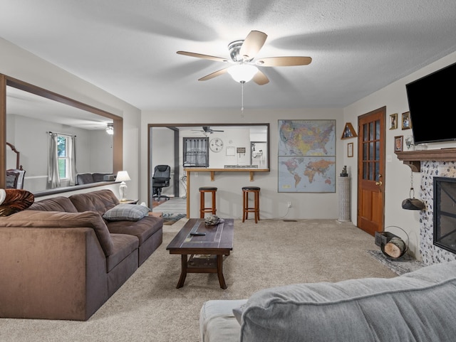 228 Anita, Spartanburg, SC 29302 - living area featuring a fireplace with flush hearth, a ceiling fan, and carpet flooring