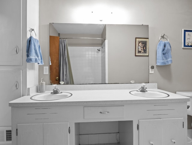 228 Anita, Spartanburg, SC 29302 - bathroom with double vanity, visible vents, and a sink
