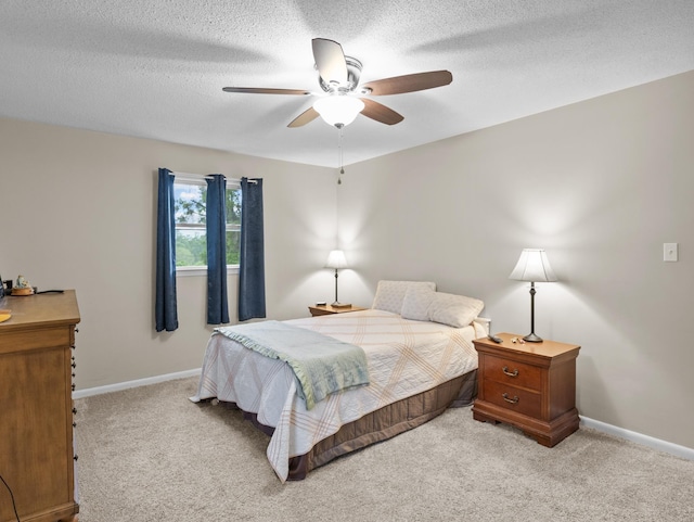 228 Anita, Spartanburg, SC 29302 - bedroom with light colored carpet, baseboards, a ceiling fan, and a textured ceiling