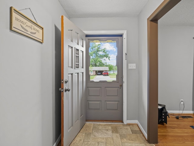 228 Anita, Spartanburg, SC 29302 - entryway with a textured ceiling and baseboards