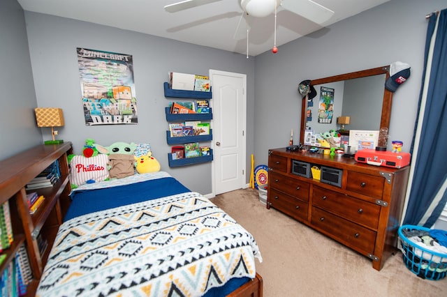carpeted bedroom with ceiling fan