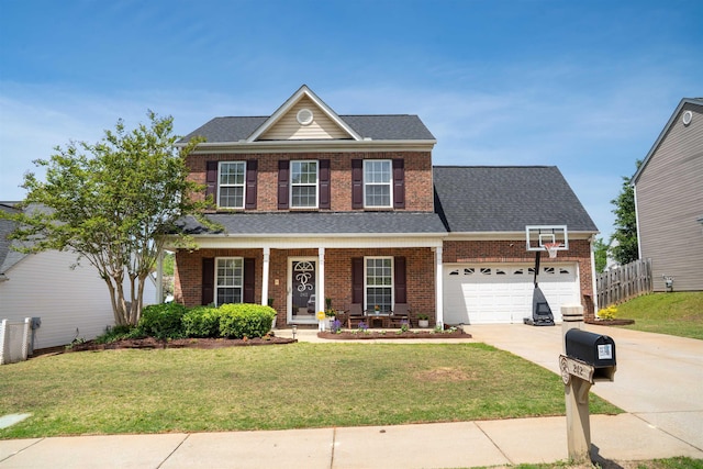 traditional-style house with concrete driveway, brick siding, fence, and a garage