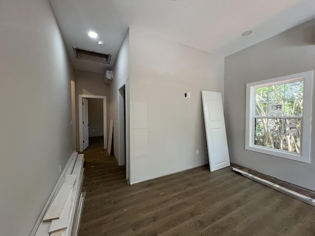 unfurnished room with dark wood-style floors