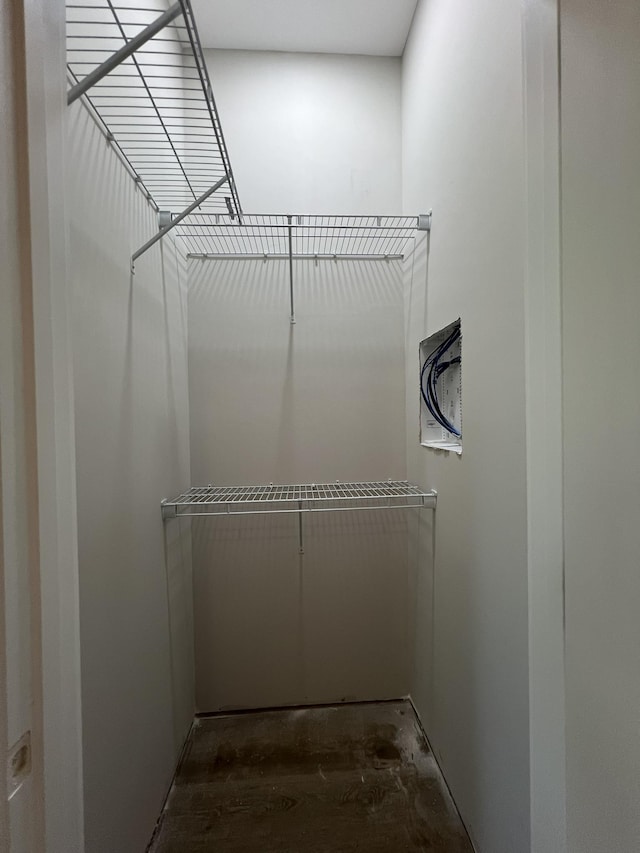 spacious closet with wood finished floors