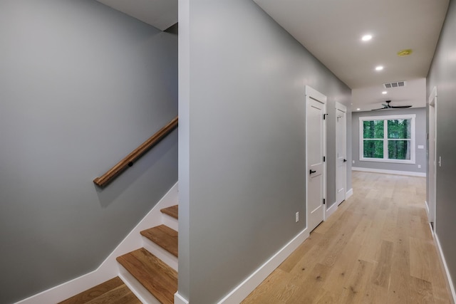 hall with baseboards, recessed lighting, visible vents, and light wood-style flooring