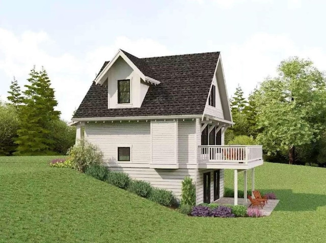 view of side of property featuring roof with shingles and a yard
