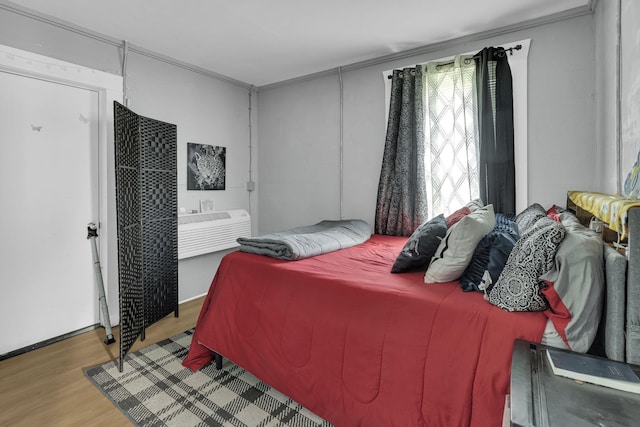 bedroom with light wood-style floors
