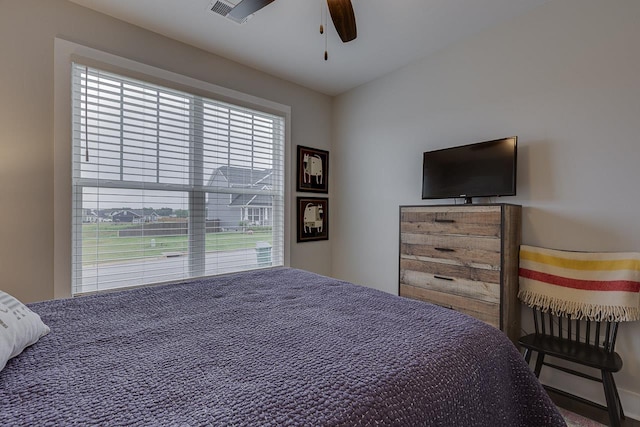 bedroom with visible vents and ceiling fan