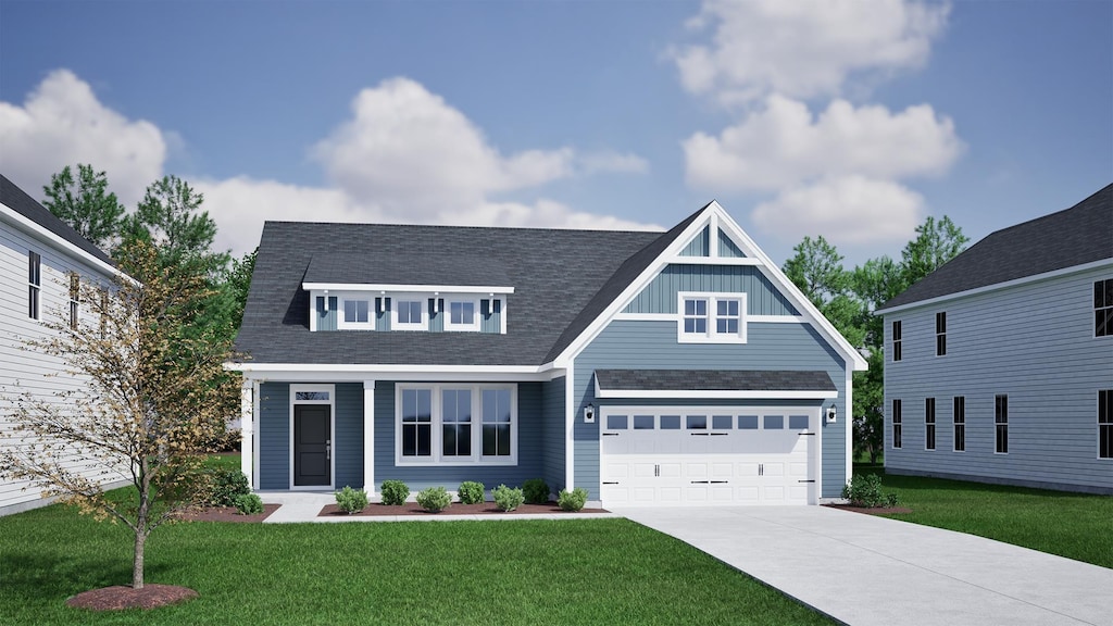 view of front facade with a garage, board and batten siding, a front yard, and concrete driveway