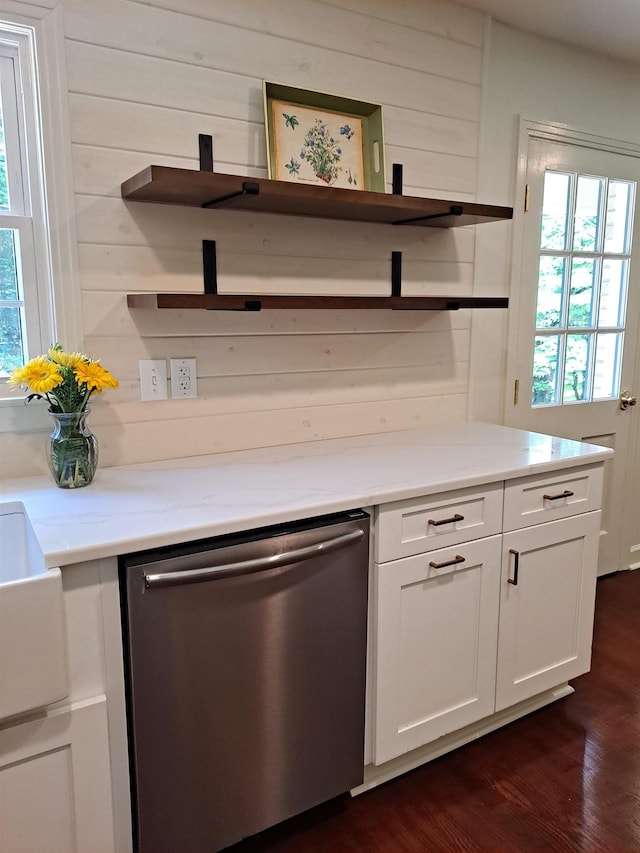 bar with wooden walls, dishwasher, and dark wood-type flooring