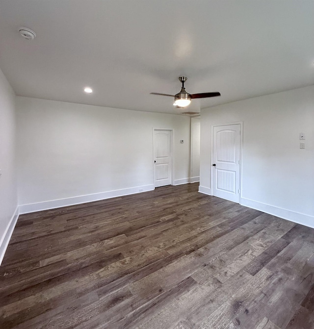 unfurnished room featuring dark wood-type flooring, ceiling fan, recessed lighting, and baseboards