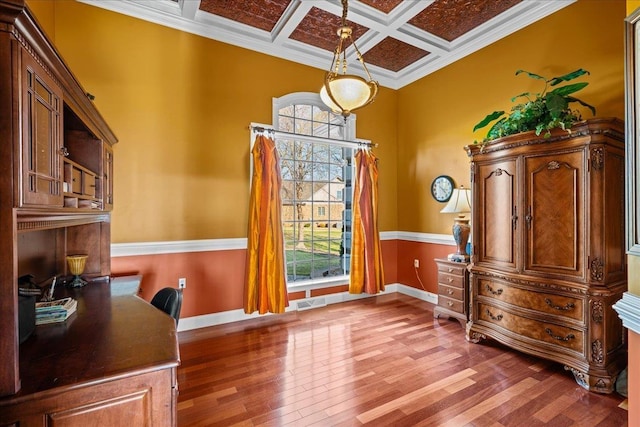 office area with crown molding, beamed ceiling, coffered ceiling, baseboards, and wood finished floors